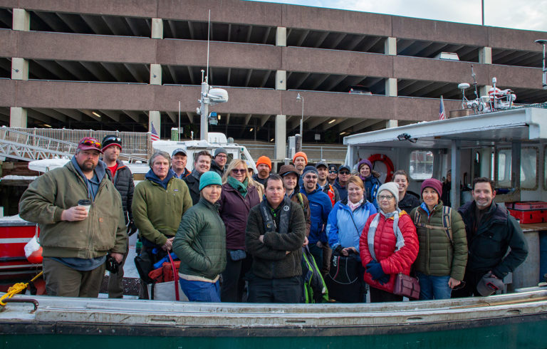 Participants in the Island Institute's Aquaculture Business Development (ABD) program join Institute staff and other guests on the boat prior to the start of the morning farm tours during the 2019 Industry Day event on December 5th in Portland.