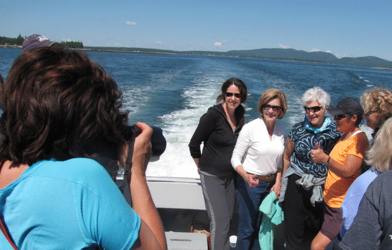 Women document their visit to the Cranberry Isles.