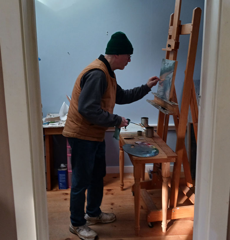 Landmesser at the easel in his Stockton Springs studio. Photo courtesy the artist.