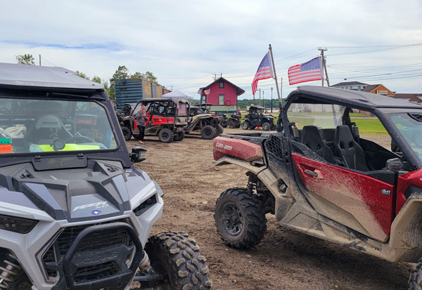 An ATV rally held adjacent to the trail.