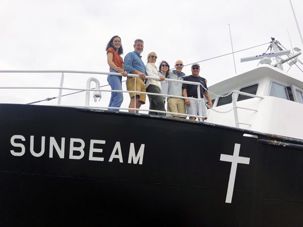 The Seacoast Mission crew aboard the Sunbeam V, from left: Siobhan Harrity, Sunbeam steward; Douglas Cornman, director of island services; Simone Babineaux, nurse practitioner; Kierie Piccininni, the Mission’s chief marketing officer; Capt. Mike Johson; and engineer Storey King. PHOTO: TOM GROENING