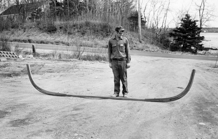 Jimmy Steele poses with the beginnings of one of his legendary peapods in a photo by Everett “Red” Boutilier. PHOTO: PENOBSCOT MARINE MUSEUM