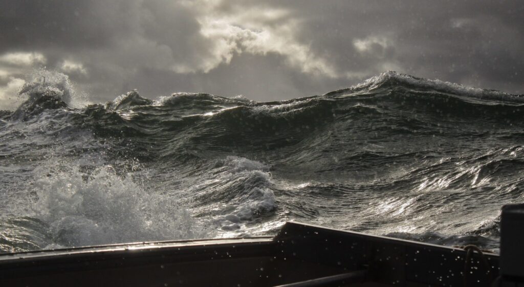 story sky and sea as seen from a fishing boat