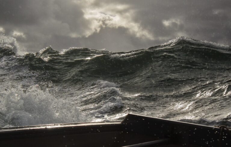 story sky and sea as seen from a fishing boat