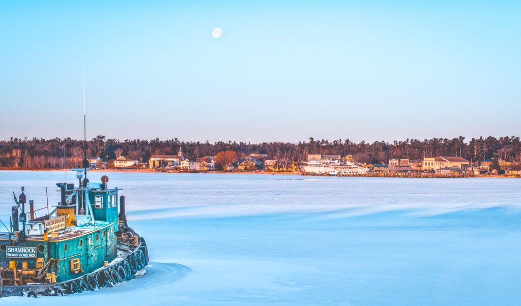 An icebreaker works toward Beaver Island.