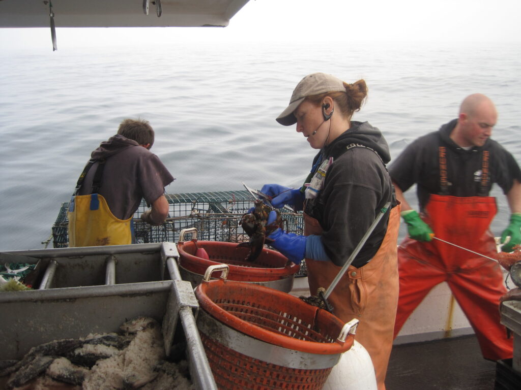 woman on a lobster boat