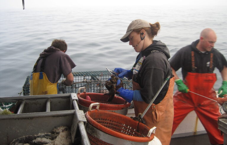 woman on a lobster boat