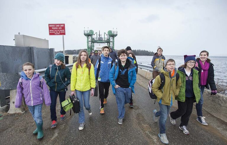 Students walking from the ferry onto Islesboro.