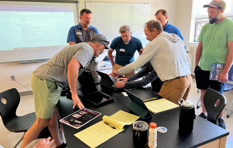 Students at work in courses on electric outboard maintenance and repair. PHOTO: YVONNE THOMAS