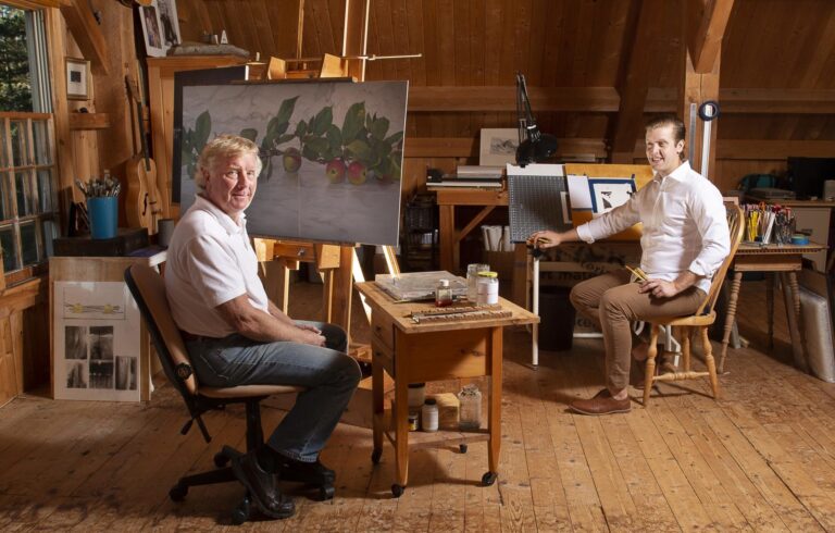 old man and son in artist studio