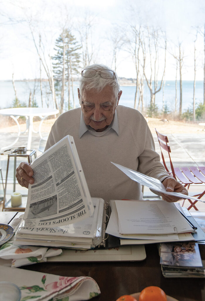 Man searches through documents and records