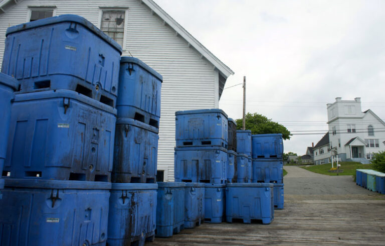 Bait bins on a pier in Cutler. FILE PHOTO: TOM GROENING