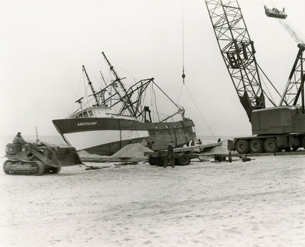 The 87-foot dragger Aristocrat after being tossed on the beach in New Jersey during the winter of 1978.