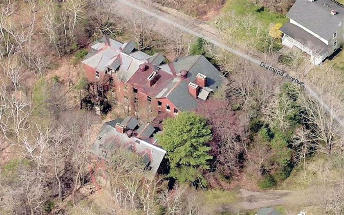 An aerial view of the building being used on a real estate website.