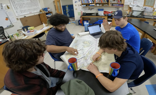 Students honed their navigation skills while planning a sea voyage around Penobscot Bay in late 2024. The assignment required five stops and accounting for the speed and fuel capabilities of the Sea Lion. PHOTO: COURTESY BELFAST MARINE INSTITUTE